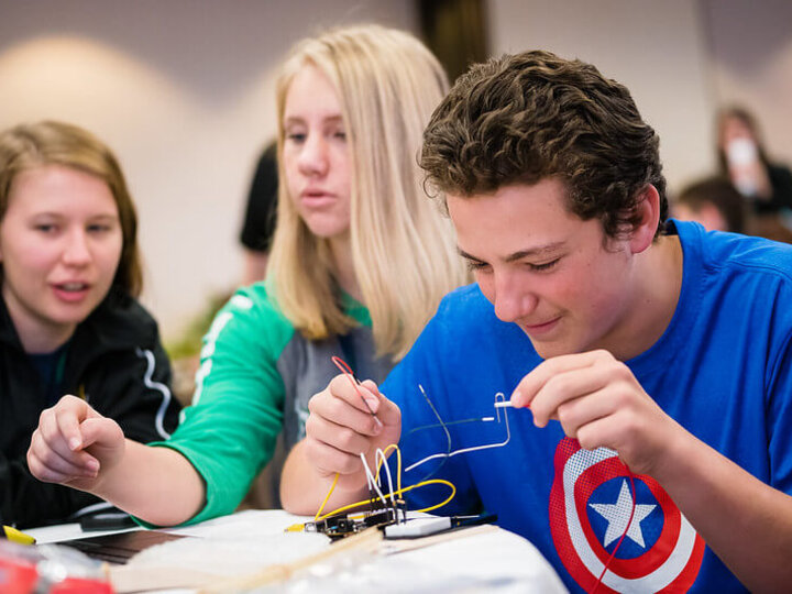 Youth participating in a STEM learning experience.